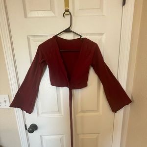 Deep red, burgundy long sleeve choli with long ties and bell sleeves. Bellydance